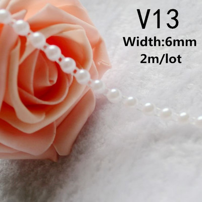 Vairāku izmēru ziloņkaula/baltas krāsas ABS imitācijas pērļu krelles ķēdes apdares šūšana kāzu ballīšu dekorēšanai.