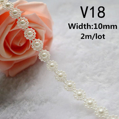 Vairāku izmēru ziloņkaula/baltas krāsas ABS imitācijas pērļu krelles ķēdes apdares šūšana kāzu ballīšu dekorēšanai.