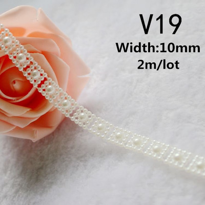 Vairāku izmēru ziloņkaula/baltas krāsas ABS imitācijas pērļu krelles ķēdes apdares šūšana kāzu ballīšu dekorēšanai.