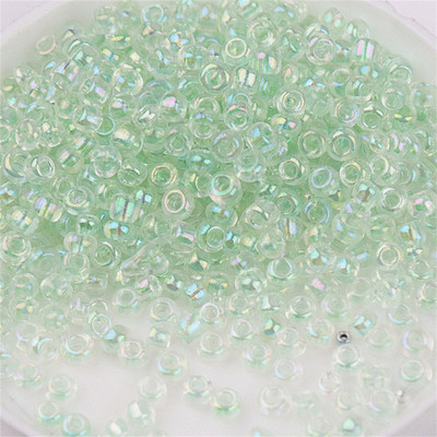 Daudzizmēru 1,5–4 mm stikla rīsu krelles burvju krāsas caurspīdīgas imitācijas Nissan krāsu izkaisītas krelles, kas izgatavotas ar savām rokām, pušķu aksesuāri