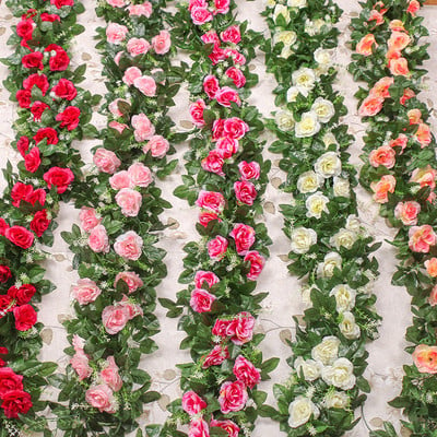33 lillepead / partiid siidist roosid luuderohi, rohelised lehed, kasutatud pere pulmade kaunistamiseks, võltslehed ise rippuv pärg ar