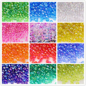 Daudzizmēru 1,5–4 mm stikla rīsu krelles burvju krāsas caurspīdīgas imitācijas Nissan krāsu izkaisītas krelles, kas izgatavotas ar savām rokām, pušķu aksesuāri