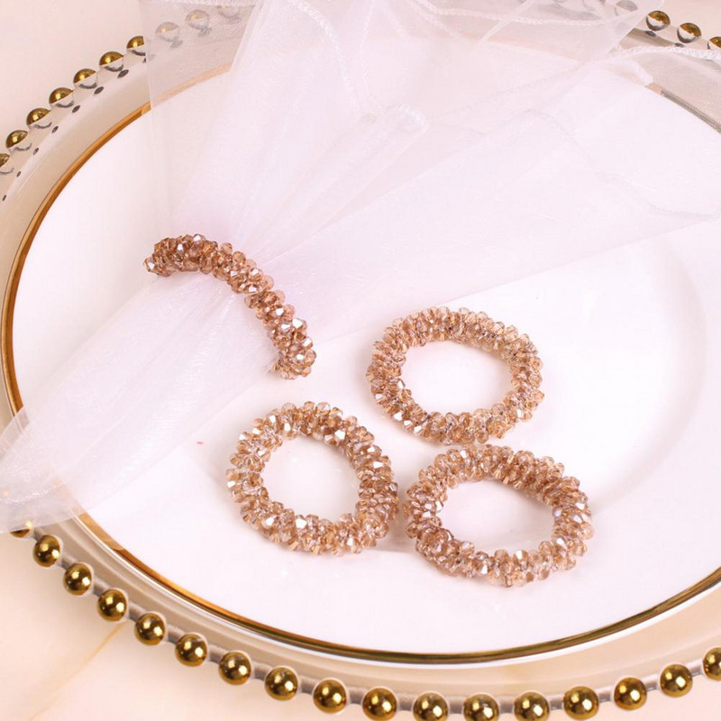 6 gab. Salvešu gredzeni Mākslīgā kristāla krelles formas salvešu turētāji Galda noformējums apaļš viesnīcas izlaiduma pusdienu galds, salvešu apļi