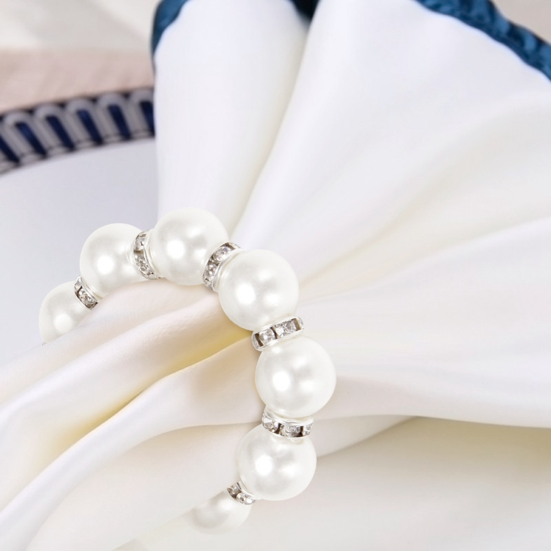 Salvešu gredzenu komplekts 12, Pērļu imitācijas, Rhinestone Pērlīšu salvešu gredzenu turētājs vakariņu galda dekorēšanai, kāzām