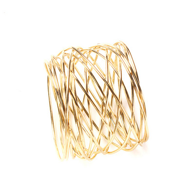 1 vnt. platus apvalus auksinis servetėlių žiedas, metalinis kryžminis tuščiaviduris drožtinis servetėlių laikiklis stalui