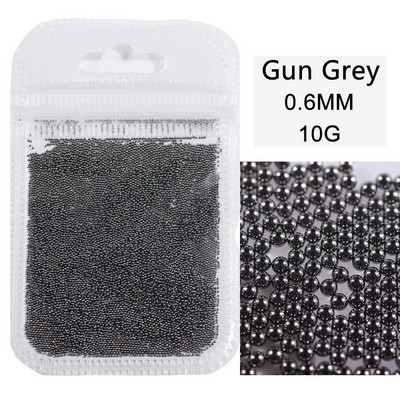 10 g/maiss 0,6 mm0,8 mm1,0 mm1,5 mm2,0 mm 3D nerūsējošā tērauda apaļa mini mirdzoša kaviāra nagu mākslas kalnu strēles akmens, kas paredzēts amatniecības dekorēšanai.