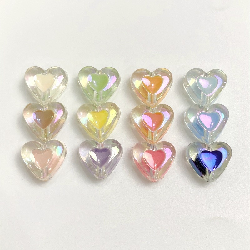 Caurspīdīgas krēmkrāsas sirds formas jaukas krelles rotaslietām. Izgatavojiet DIY piekariņus Tālruņa ķēde Rokassprādze Kaklarota Matu Kaklasaites Aksesuāri