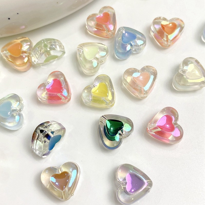 Caurspīdīgas krēmkrāsas sirds formas jaukas krelles rotaslietām. Izgatavojiet DIY piekariņus Tālruņa ķēde Rokassprādze Kaklarota Matu Kaklasaites Aksesuāri