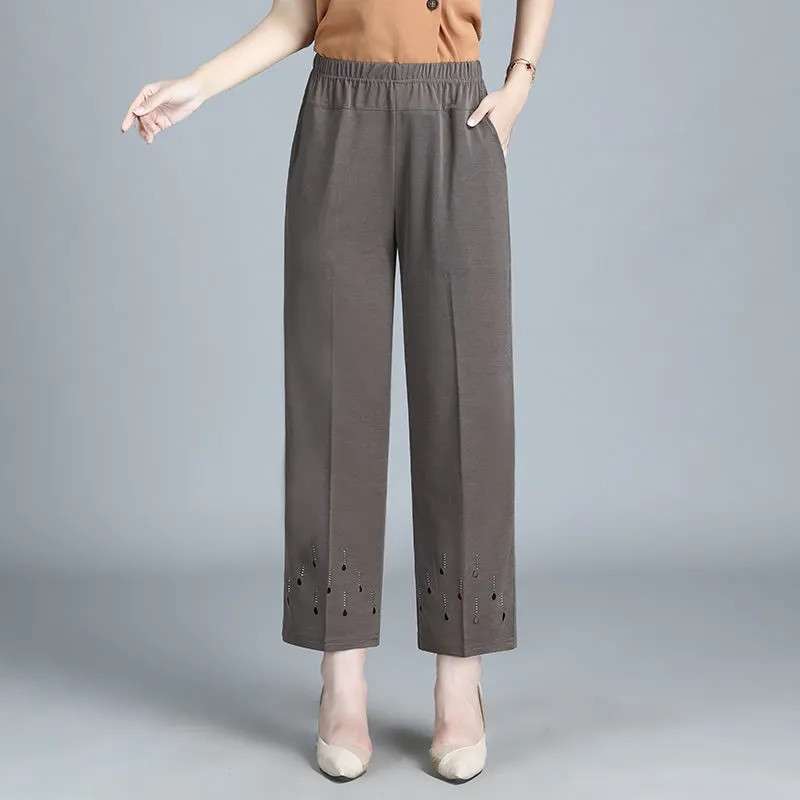 Vasaras sieviešu plānas apgrieztas bikses Jaunas elastīgas ar augstu vidukli taisnas bikses dobas brīvas pusmūža sieviešu ikdienas bikses 8XL