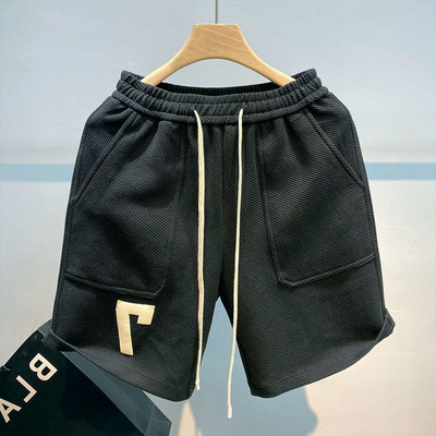 Korea stiilis soliidsed lühikesed püksid meestele suvised mitmekülgsed vabad spordipüksid vabaaja trendikad suvepüksid meeste rannastiilis lauapüksid