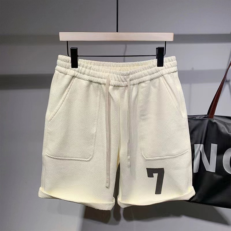 Korea stiilis soliidsed lühikesed püksid meestele suvised mitmekülgsed vabad spordipüksid vabaaja trendikad suvepüksid meeste rannastiilis lauapüksid