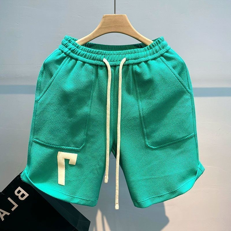 Korea stiilis soliidsed lühikesed püksid meestele suvised mitmekülgsed vabad spordipüksid vabaaja trendikad suvepüksid meeste rannastiilis lauapüksid