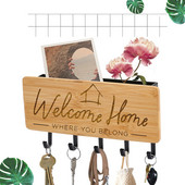 Seina võtmehoidja Koduukse tagakaunistus Loov bambusest graveeritud võtmehoidja riidepuu Väikesed muud esemed Hoiukonksud Riiul