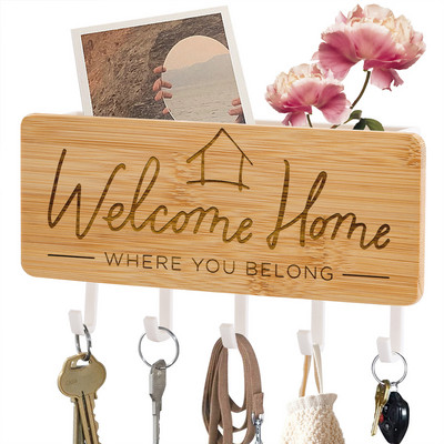 Seina võtmehoidja Koduukse tagakaunistus Loov bambusest graveeritud võtmehoidja riidepuu Väikesed muud esemed Hoiukonksud Riiul