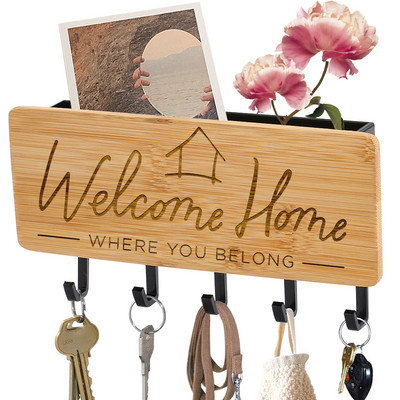 Seina võtmehoidja Koduukse tagakaunistus Loov bambusest graveeritud võtmehoidja riidepuu Väikesed muud esemed Hoiukonksud Riiul