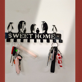 Γλυκός οικιακός γάντζος τοίχου Ράφι αποθήκευσης Μαύροι μεταλλικοί γάντζοι τοίχου Αυτοκόλλητος γάντζος Μπρελόκ Κρεμάστρα για πετσέτες κουζίνας Ρόμπα ρούχων