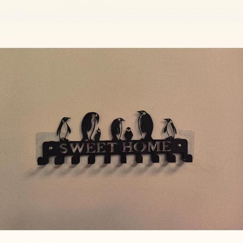 Γλυκός οικιακός γάντζος τοίχου Ράφι αποθήκευσης Μαύροι μεταλλικοί γάντζοι τοίχου Αυτοκόλλητος γάντζος Μπρελόκ Κρεμάστρα για πετσέτες κουζίνας Ρόμπα ρούχων