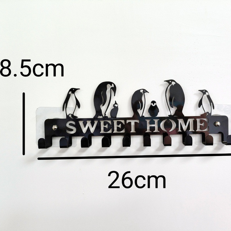 Γλυκός οικιακός γάντζος τοίχου Ράφι αποθήκευσης Μαύροι μεταλλικοί γάντζοι τοίχου Αυτοκόλλητος γάντζος Μπρελόκ Κρεμάστρα για πετσέτες κουζίνας Ρόμπα ρούχων