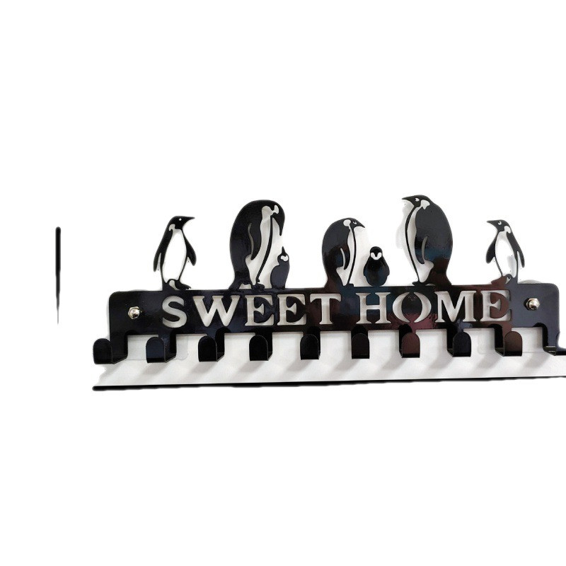 Γλυκός οικιακός γάντζος τοίχου Ράφι αποθήκευσης Μαύροι μεταλλικοί γάντζοι τοίχου Αυτοκόλλητος γάντζος Μπρελόκ Κρεμάστρα για πετσέτες κουζίνας Ρόμπα ρούχων