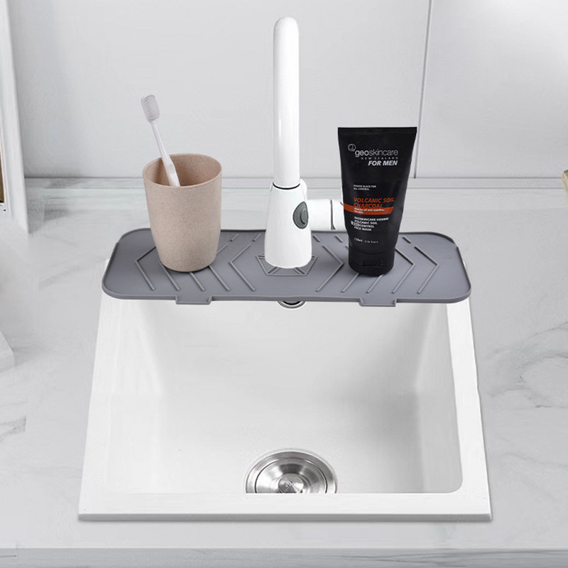 Izlietnes šļakatu aizsargs Drenāžas paliktnis Ūdens silikona jaucējkrāns Absorbējošais savācējs Paklājiņi Izlietnes Countertop aizsargs Vannas istabas virtuves sīkrīkam