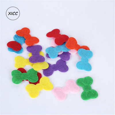 100 gab. Neausti smaida ziedi tauriņi vilnas filca audums matu virve DIY roku darbs aksesuāru uzlīmes aplikācijas ielāpi Filca paliktnis