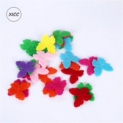 100 gab. Neausti smaida ziedi tauriņi vilnas filca audums matu virve DIY roku darbs aksesuāru uzlīmes aplikācijas ielāpi Filca paliktnis