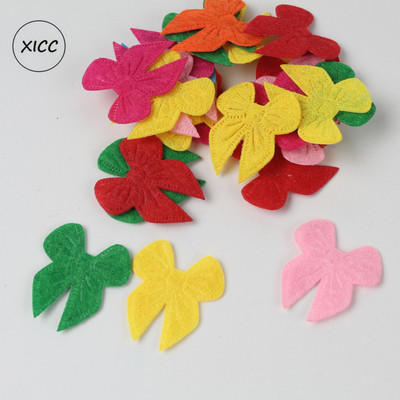 100 gab. Neausti smaida ziedi tauriņi vilnas filca audums matu virve DIY roku darbs aksesuāru uzlīmes aplikācijas ielāpi Filca paliktnis