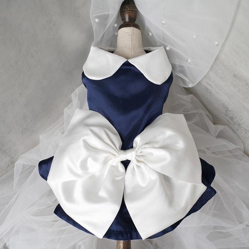 Stilīgs mājdzīvnieku apģērbs, kas dekorē mājdzīvnieku kleitu ar augstu elastību Bowknot Sweet Dog White Princess kleitas ar Bowknot suņu apģērbu