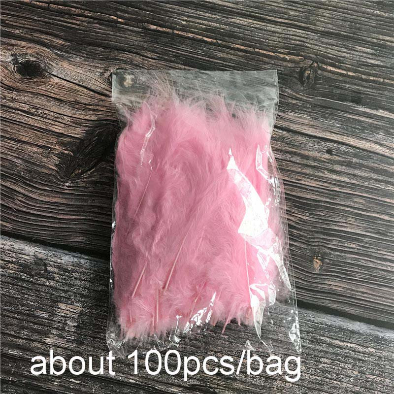 Natūralios žąsų povo plunksnos spalvotos gulbės plunksnos, skirtos namų dekoravimui. „Pasidaryk pats“ vakarėlio papuošalų dovanų dėžutės dekoracijos