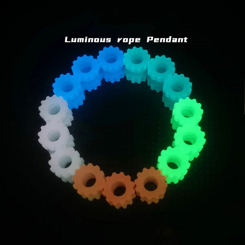 Világító farokcsat kültéri taktikai hátizsák-tartozékok ABS cipzárral húzható esernyő kötél fogantyú EDC kés függő zsinór szerszámok