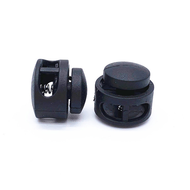 10 vnt. Dvigubos skylės spyruoklinio laido užraktas apvalus rutulio formos perjungimo kamšteliai, stabdantys slankiojantys laido tvirtinimo elementai Spynos mygtukai galų keitimas