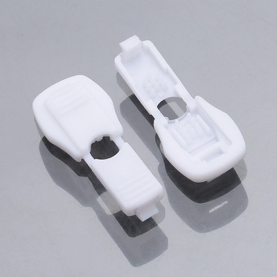 10 gab. Apģērbu auklas gali, rāvējslēdzējs, neilona slēdzene, apavu auklas sprādze