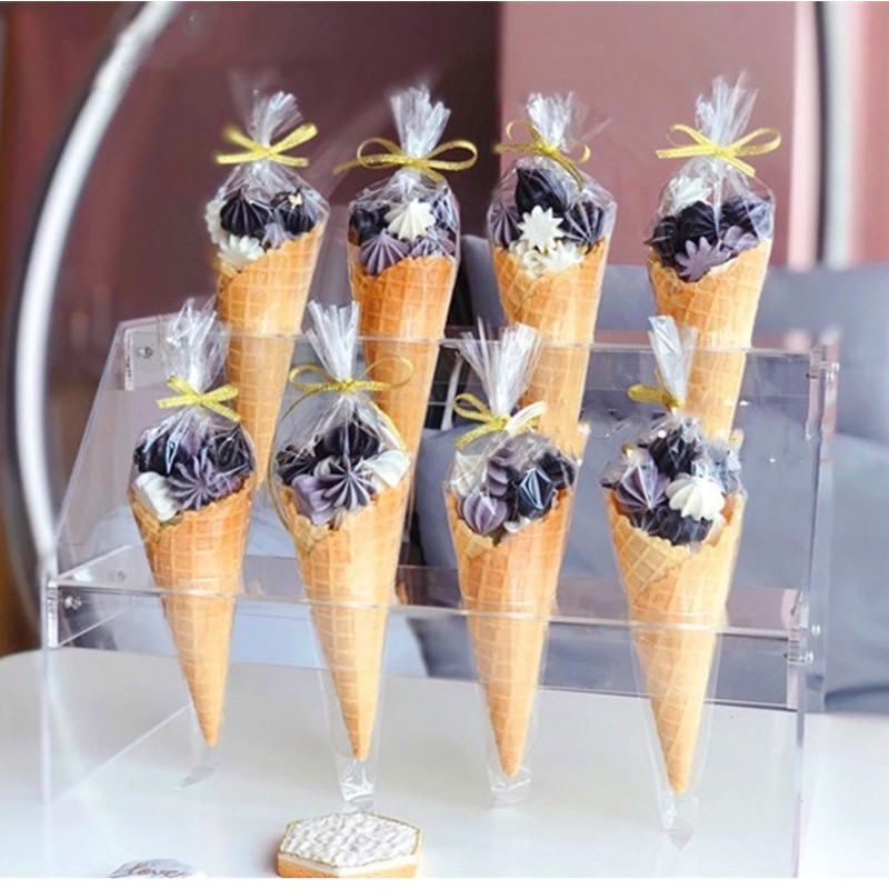 50 tk / komplekt läbipaistev tsellofaanist pakkekott läbipaistev koonus kommikott meisterdamiseks pulma sünnipäevapeokott Popkorni kilekott