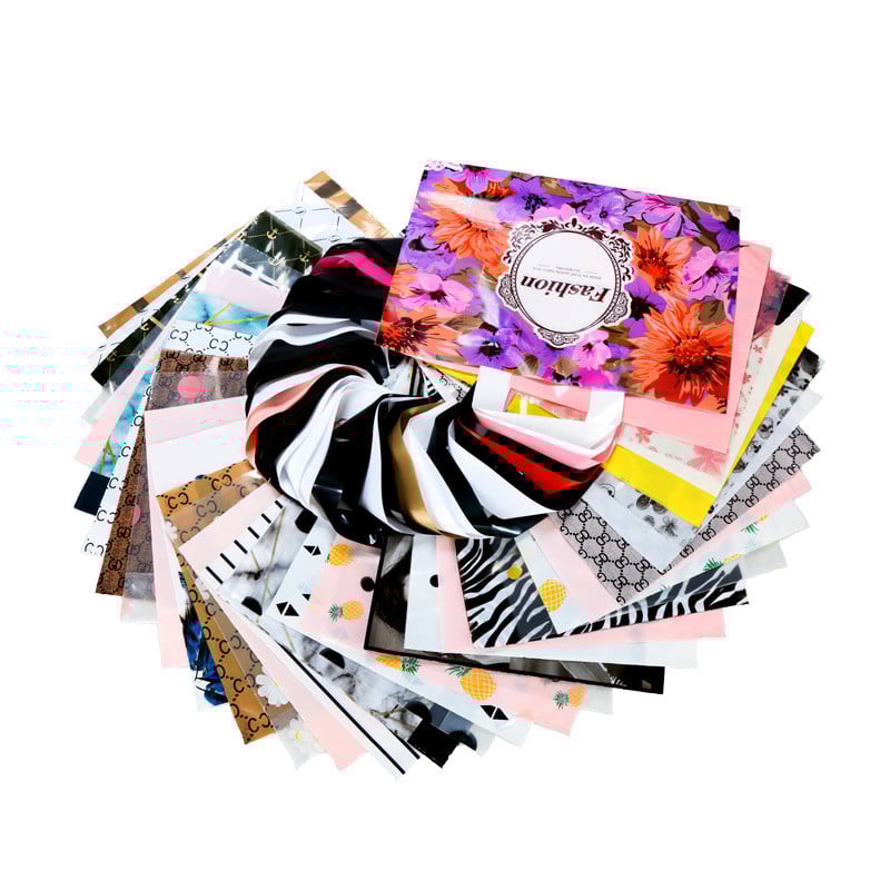 5 tk paksu ehete plastikust käepidemetega kott Armsad mitmesuguse mustriga kilekotid käepidemega kinkekarbiga pulmapeo pakend