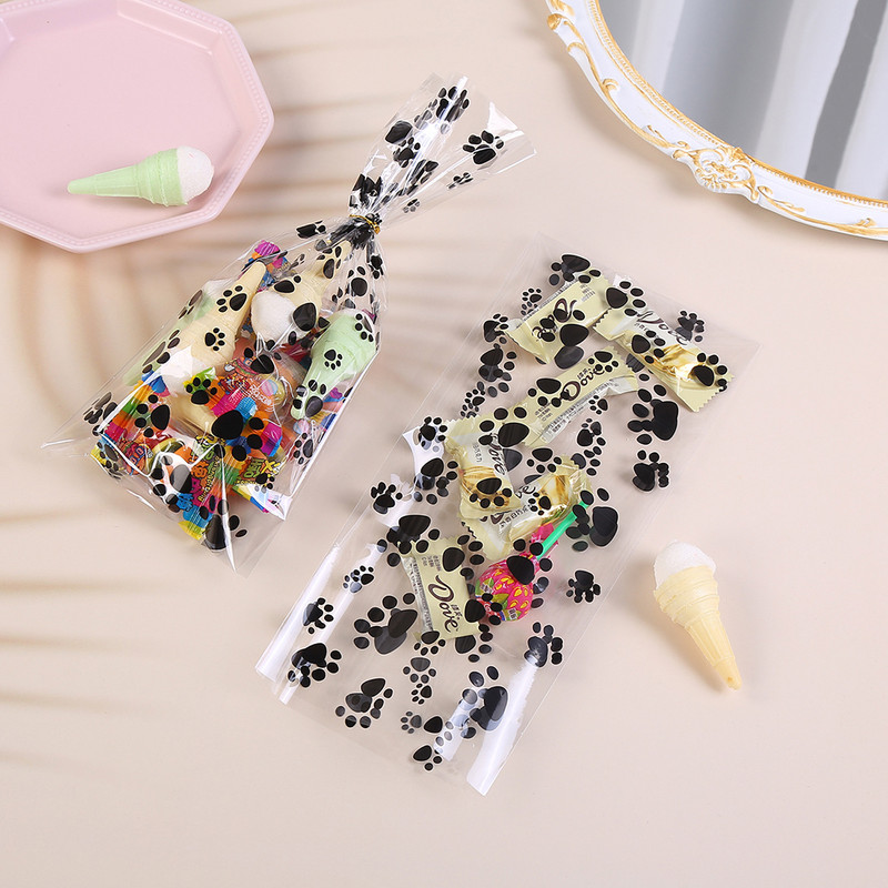 50 gab. Mājdzīvnieku ķepu apdrukas celofāna maisiņš, karsti aizzīmogots konfekšu maisiņš, suņu kaķu dāvanu maisiņš ar dzimšanas dienas ballītes bērnu uzkodu iepakojuma maisiņu