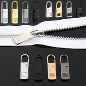 5/10 gab. Rāvējslēdzēja slīdnis Metāla rāvējslēdzēja labošanas pievilkšanas nomaiņa Noņemama rāvējslēdzēja pievilkšanas cilne, kas paredzēta šūšanai, auduma jakas rāvējslēdzēja galvai