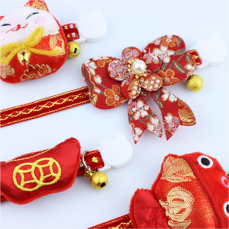 Jaungada ķīniešu sarkanā kaķa apkakles ilgmūžības slēdzene svin kucēnu kaklarotu ar kulonu zvaniņu Breakaway suns mājdzīvnieku kaķēnu aksesuāri