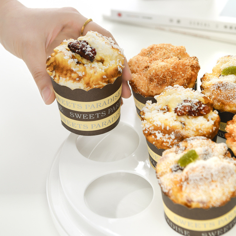 Pārnēsājama kūku uzglabāšanas kaste ar 7 caurumiem kūciņu nesēja turētājs Svaigi uzglabājams kūku trauka paplāte Konditorejas izstrādājumu kūku pārtikas iepakojuma kaste