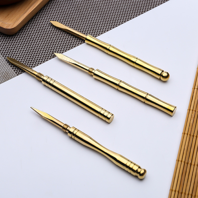 Ķīniešu stila tējas mākslas rīks Radošais misiņa tējas nazis Tējas kūka Daudzfunkcionāla tējas ceremonijas piederumi Mājsaimniecības tējas adatu komplektsZC367