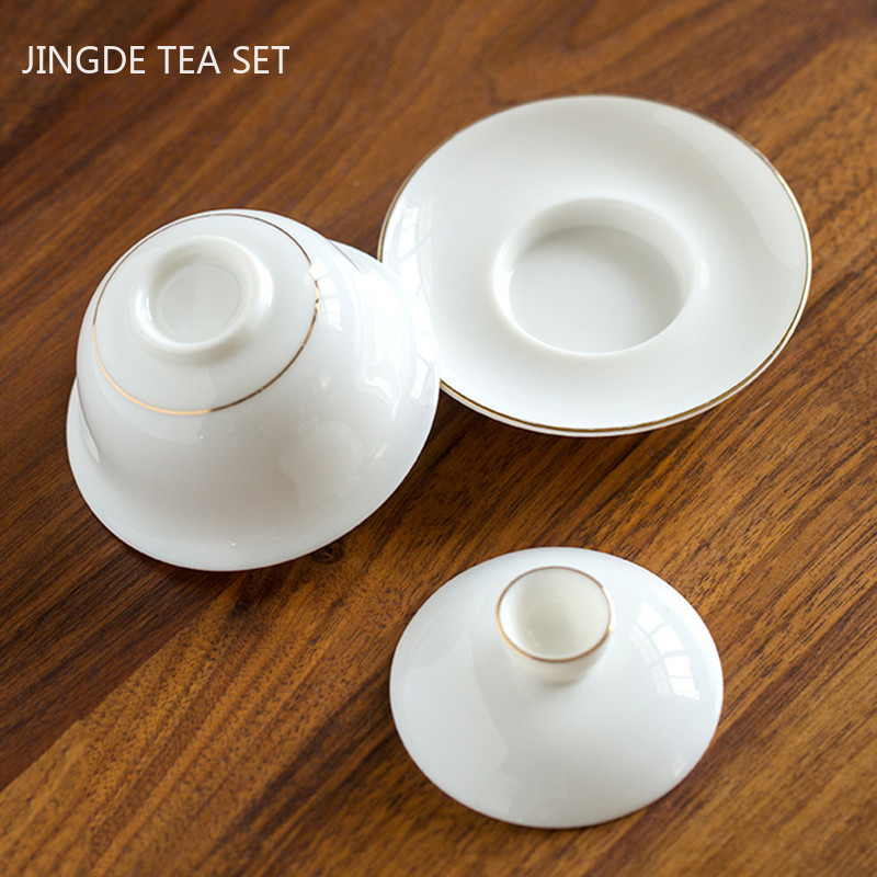 Ar rokām darināta baltā porcelāna tējas automāts mājsaimniecības Sancai Gaiwan tējas ceremonijas aksesuāri Boutique keramikas tējas bļoda ar vāku