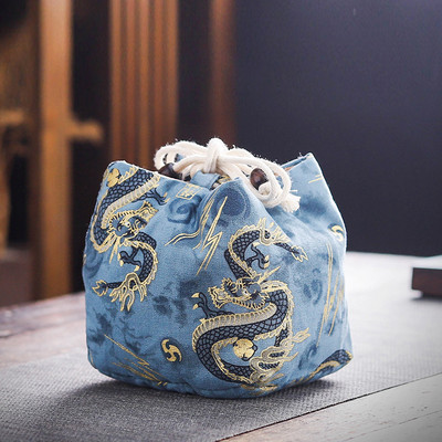 Daudzfunkcionāls ceļojumu tējas trauku glabāšanas maisiņš.