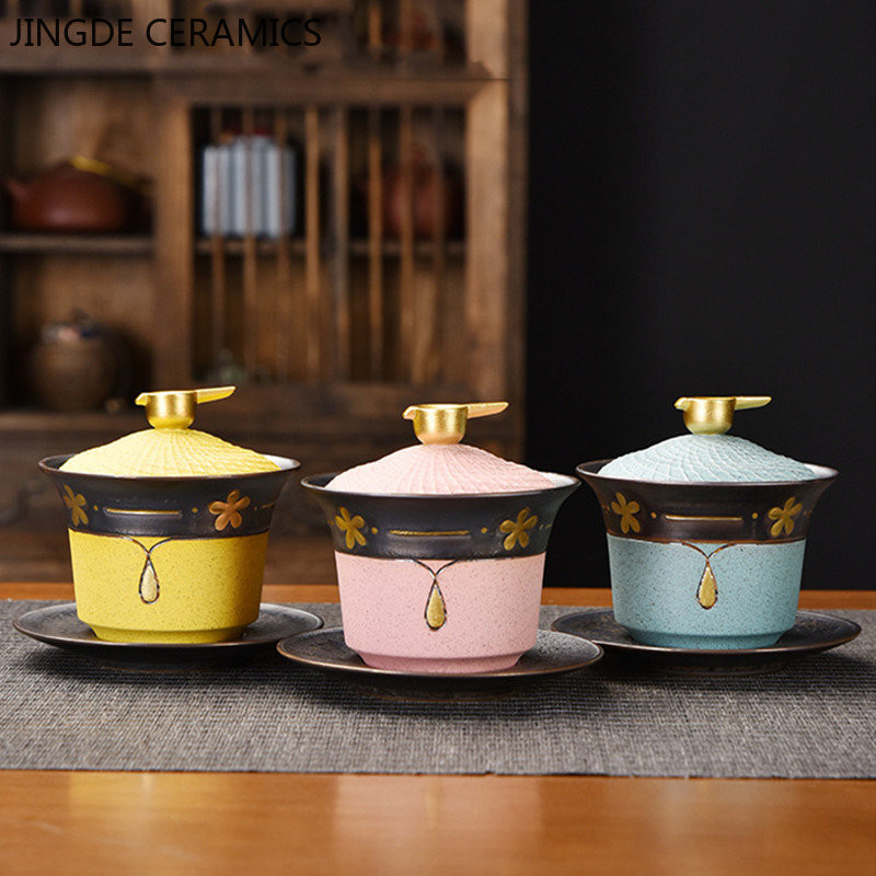 Ķīniešu stila keramikas Gaiwan Lotus Flower Tracing zelta tējas krūzes tējas trauks mājsaimniecības retro tējas komplekts, pielāgots rokām gatavots tējas infuzētājs