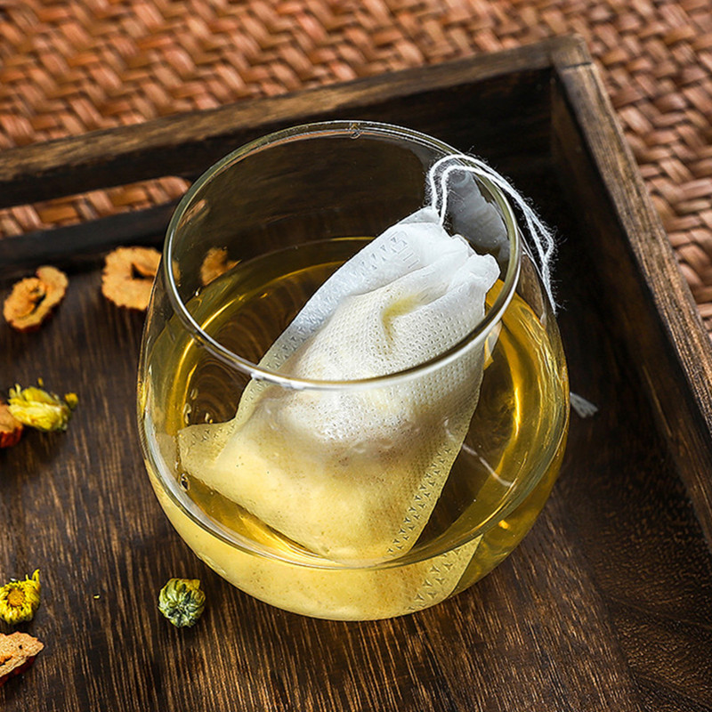 Eldobható teászacskók 100 db/tétel Üres nem szőtt, húzózsinóros zacskó 5,5x7 cm-es pecsétszűrős, fűszernövény fűszeres laza kávézacskós eszköz