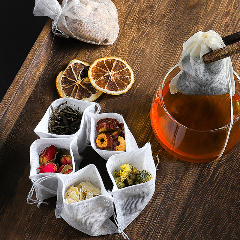 Eldobható teászacskók 100 db/tétel Üres nem szőtt, húzózsinóros zacskó 5,5x7 cm-es pecsétszűrős, fűszernövény fűszeres laza kávézacskós eszköz