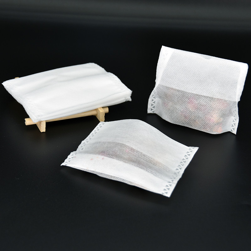 100 vnt. 65 x 70 mm neaustinio audinio filtro maišelis Tuščias arbatos kavos prieskonių žolelių priešais sulankstymas Uždaryti su apačia didele talpa