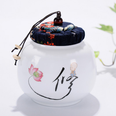 Pārnēsājamas ceļojumu matētas smērvielas, baltas keramikas, aizzīmogotas uzglabāšanas burka kafijas pupiņu tēja, konfekšu cepumi, pārklāti virtuves uzglabāšanas pudeļu kārbas