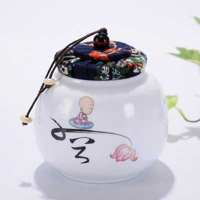 Pārnēsājamas ceļojumu matētas smērvielas, baltas keramikas, aizzīmogotas uzglabāšanas burka kafijas pupiņu tēja, konfekšu cepumi, pārklāti virtuves uzglabāšanas pudeļu kārbas