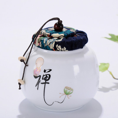 Pārnēsājamas ceļojumu matētas smērvielas, baltas keramikas, aizzīmogotas uzglabāšanas burka kafijas pupiņu tēja, konfekšu cepumi, pārklāti virtuves uzglabāšanas pudeļu kārbas