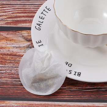 100 бр. Старинен чай запарка Практична ароматизирана билкова връв за еднократна употреба Торбички за чай Запечатан филтър Празни хартиени торбички за кафе
