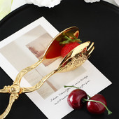 Jauna, moderna cinka sakausējuma kūka Pārtikas knaibles Augļu šķīvju salāti Deserta saspraude Virtuves piederumi Mājsaimniecības gatavošanas rīki Aksesuāri